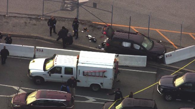 Photo: shooting outside the NSA headquarters in Fort Meade, Maryland. There appears to be an SUV with bullet holes in the windshield near the entrance to the NSA