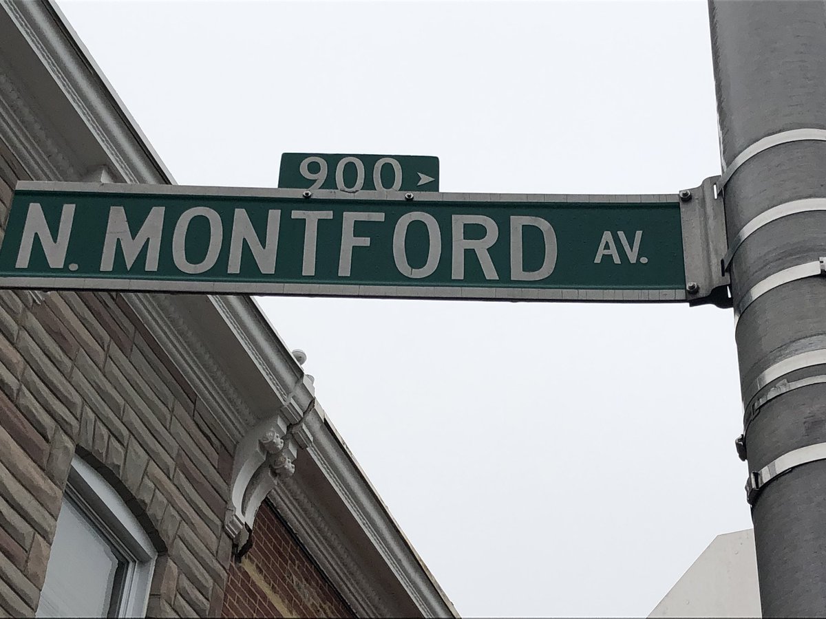 Over 30 crime scene markers at 800 block Montford Ave. in East Baltimore. This is one of several crime scenes related to a quadruple shooting overnight that ended in a car accident and foot chase with 3 arrested and 3 guns recovered a few blocks away