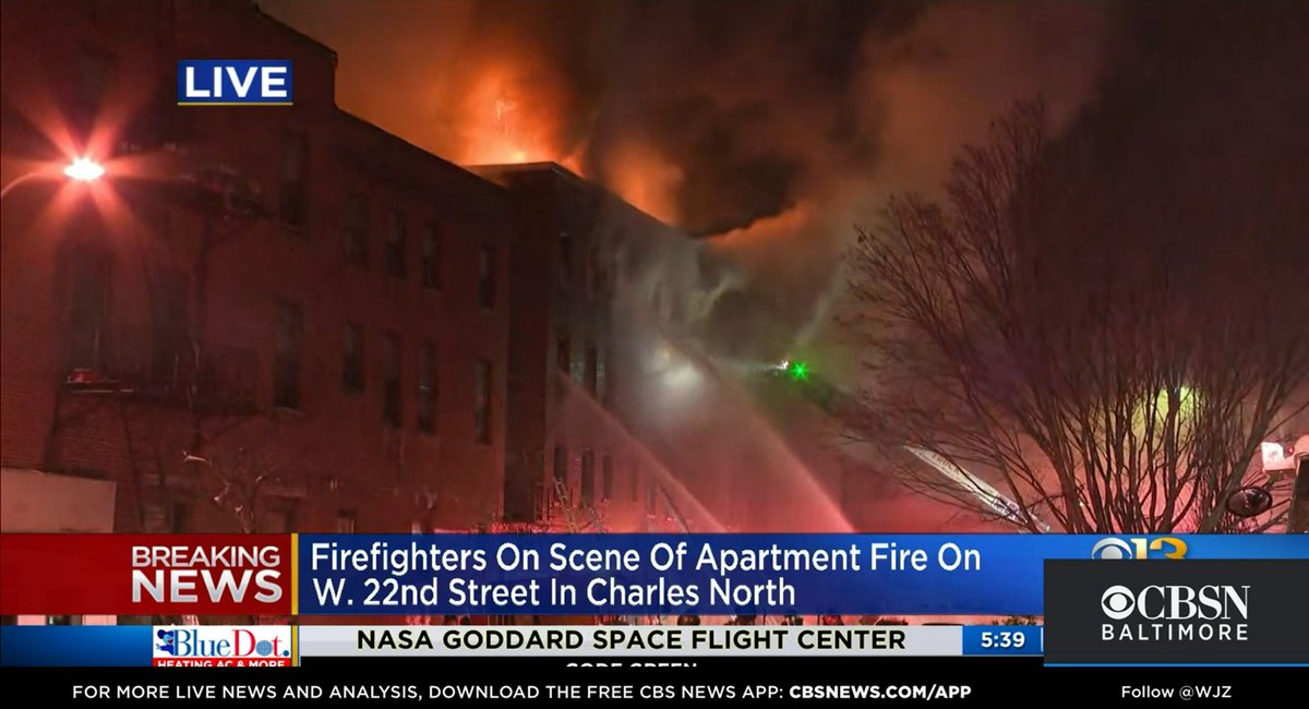 Four-alarm fire at apartment building in Baltimore. No injuries reported. 