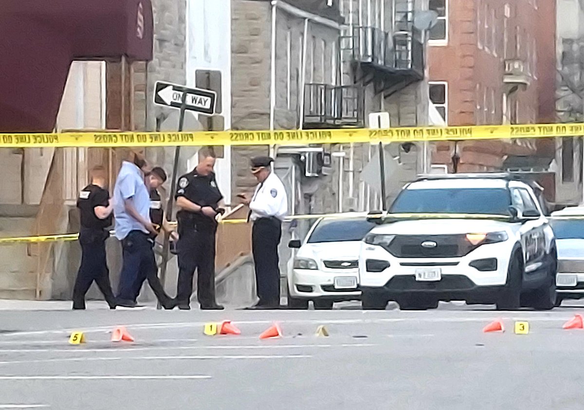 Many of the shell casings appear to be outside of the McCulloh Convenience Store