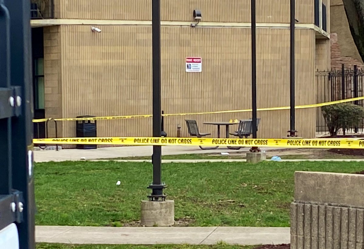 Evidence markers on a table, still an active scene outside Bel-Park Tower after a mid-day shooting not far from Pimlico