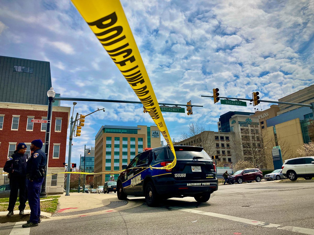 A shooting leaves at least 28 evidence markers and injuries in the shadow of Kennedy Krieger Institute & Johns Hopkins hospital this morning