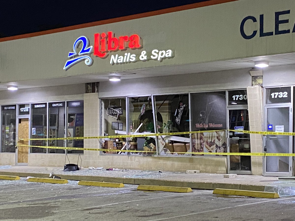 Here's a look at the scene of the minor explosion that happened here last night at Libra Nails and Spa at the Security Station shopping center on Rolling Rd.  Caution tape up over several damaged businesses and shattered storefront glass.   Investigation remains ongoing