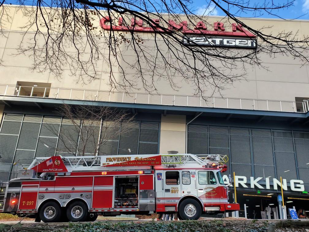 Engine 291 & Truck 297 are on scene with @BaltCoFire  and @LVFC30 at 111 E Joppa Rd Towson. Firefighters have extinguished a car fire in the parking garage. They are now removing smoke from the garage and the movie theater. Some area roads are blocked