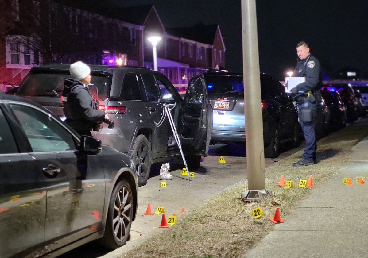 There are nearly four dozen shell casings, a shoe, and at least one crutch at this crime scene