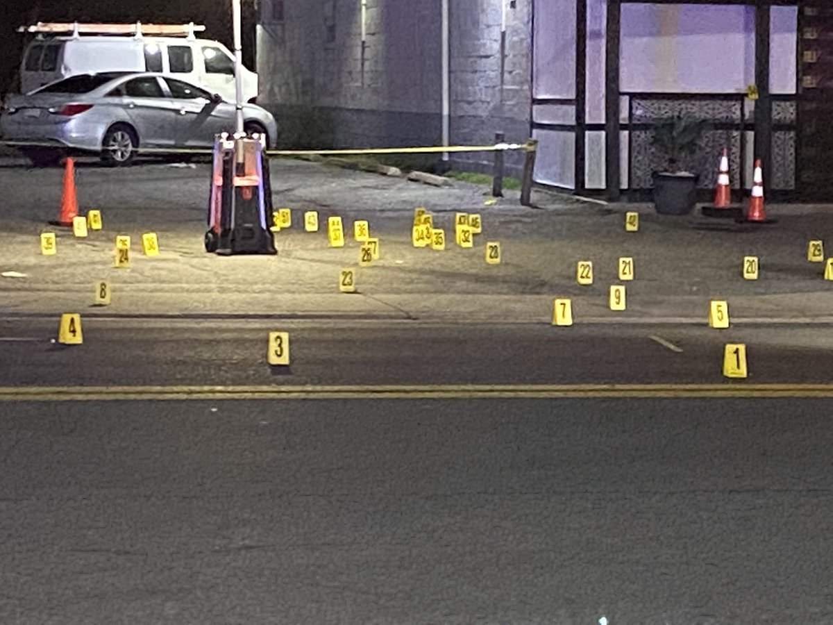 At least 50 evidence markers in the parking lot. 4 people shot at a strip club in Hyattsville Maryland, one has died