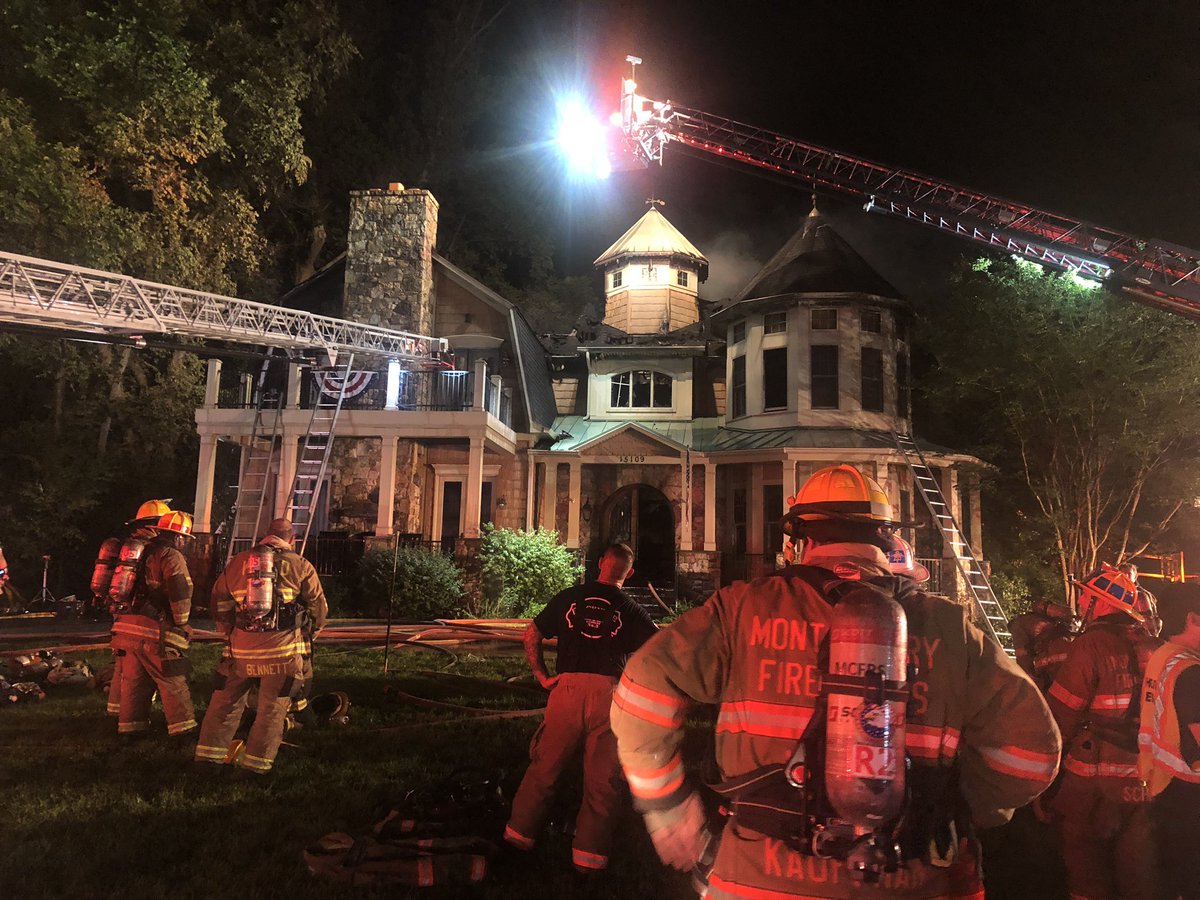 Rosecroft Rd, residents were home , 1st alerted by an explosion outside  and  discovered fire, There were several reports of explosions, both before and  while units were operating. Fire Investigators found several camping style propane tanks that had obviously exploded IAO origin
