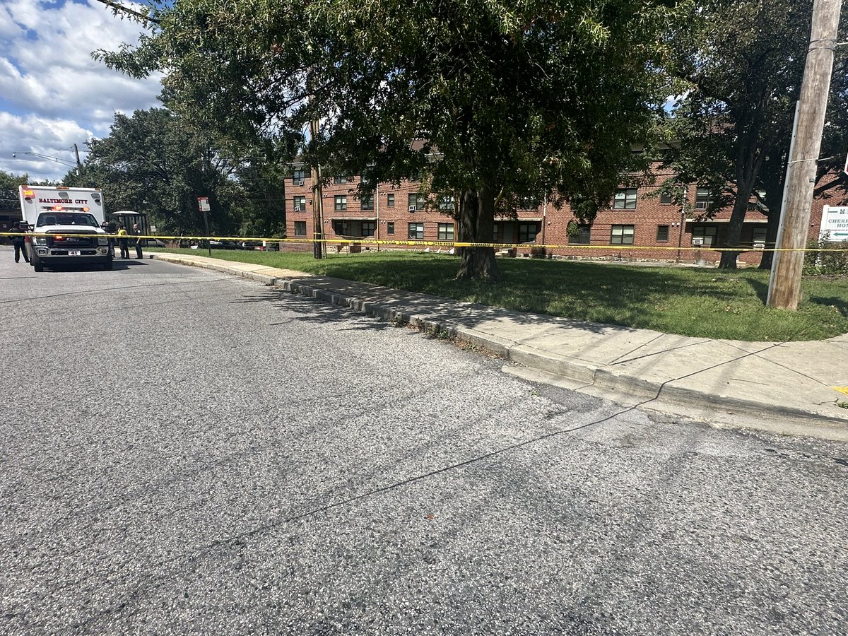 A suspect is in custody after shooting at police and a security guard during a foot pursuit in South Baltimore on Wednesday afternoon