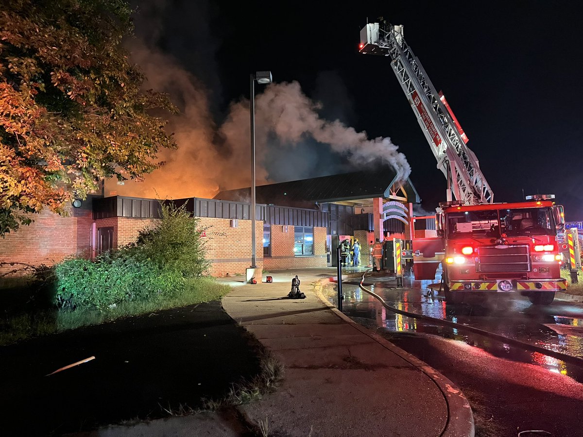 Midnite  - Beacon Rd, @mcfrs @PGFDNews FFs remain on scene, bulk of fire contained & FFs still engaged in active firefighting operations, fire seems to be burning in concealed & void spaces, school bldg under construction & scheduled for demolition, the area is fenced off