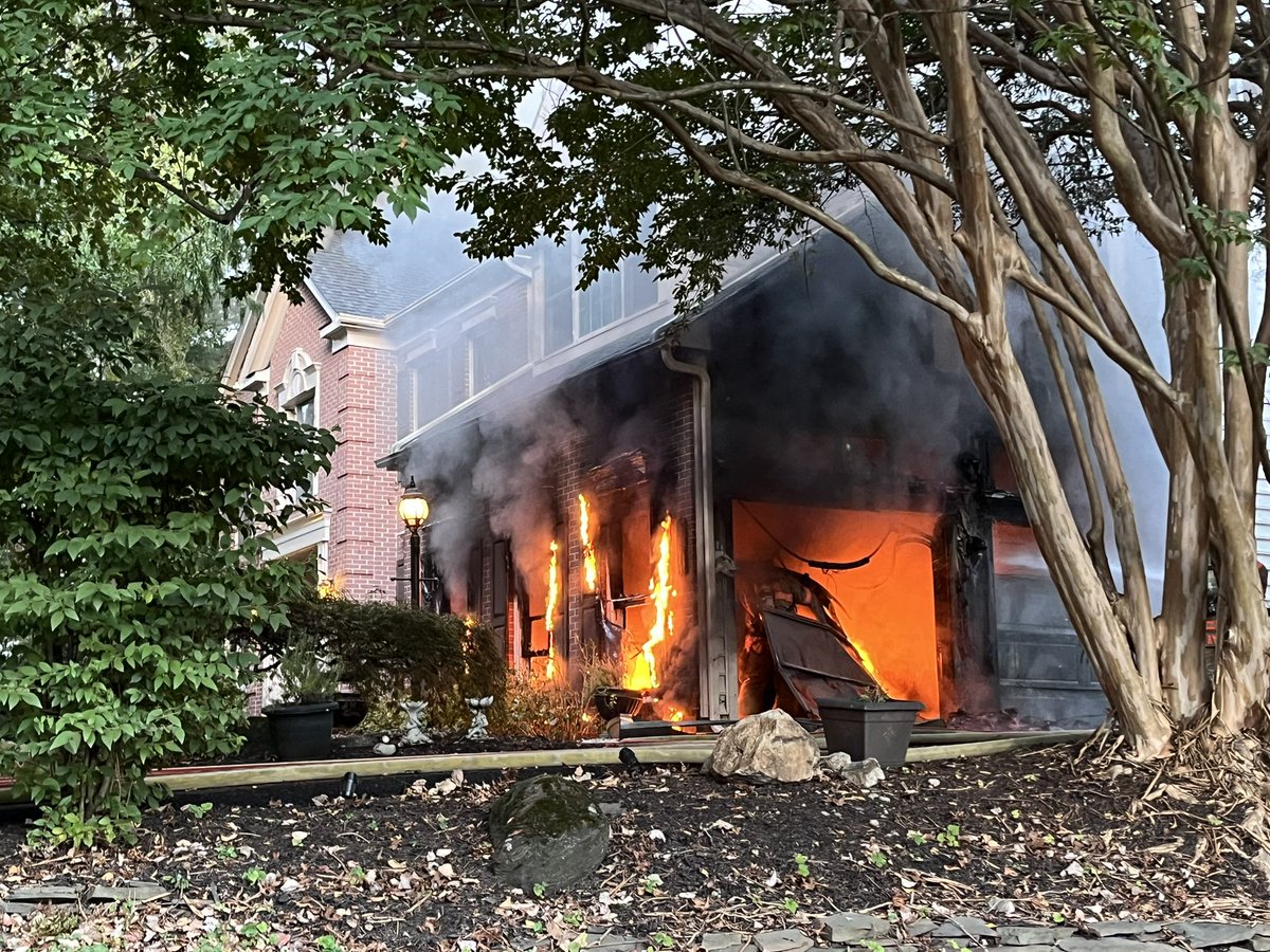 13600 blk Cherrydale Dr, single-family house; occupied, neighbor alerted family to fire in garage; Origin/Cause, floor level just inside overhead garage doors, possibly caused by improperly disposed smoking materials/cigarettes; Damage ~$500K; 4 adults displaced; no inj