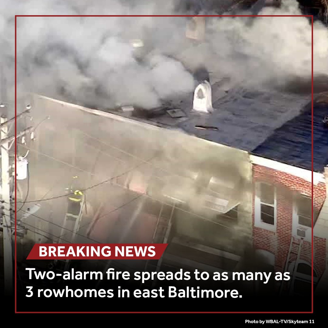 Firefighters battled a two-alarm fire that spread to as many as three rowhomes in east Baltimore.