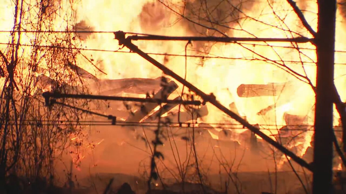 A large brush fire is ablaze in Woodberry as fire crews attempt to put it out.