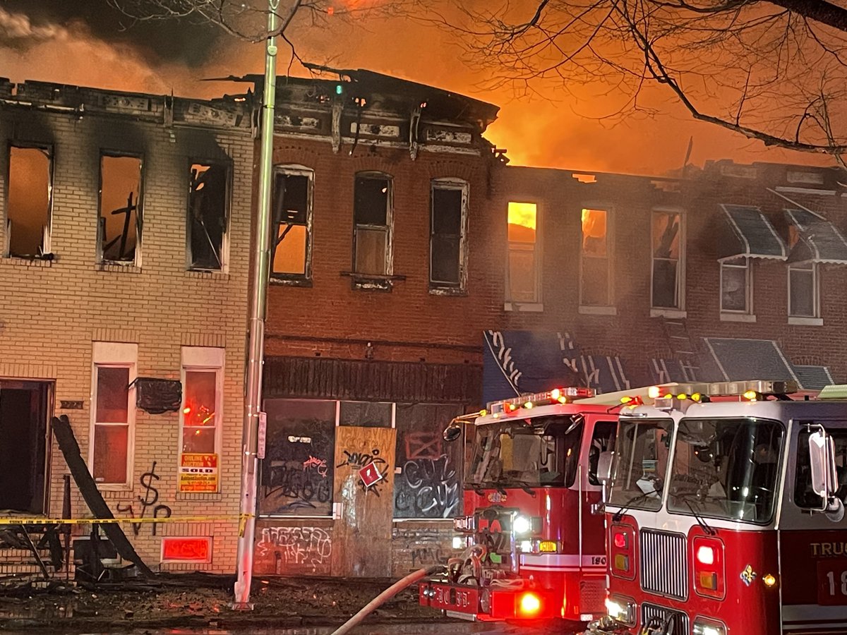 Scene of a 3-alarm @BaltimoreFire at times burning out of control along a block of rowhouses & store front businesses & a church in W. Baltimore along Fulton Ave near Reisterstown Rd. 