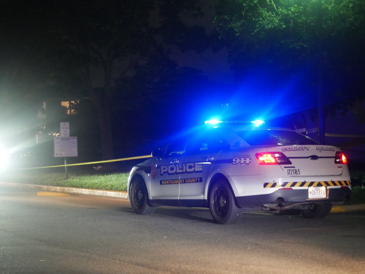 Montgomery County Police investigating a reported shots fired incident on Castle Terrace around midnight. Ambulance just left without a patient; no injuries reported. Nearby roads closed for evidence collection 