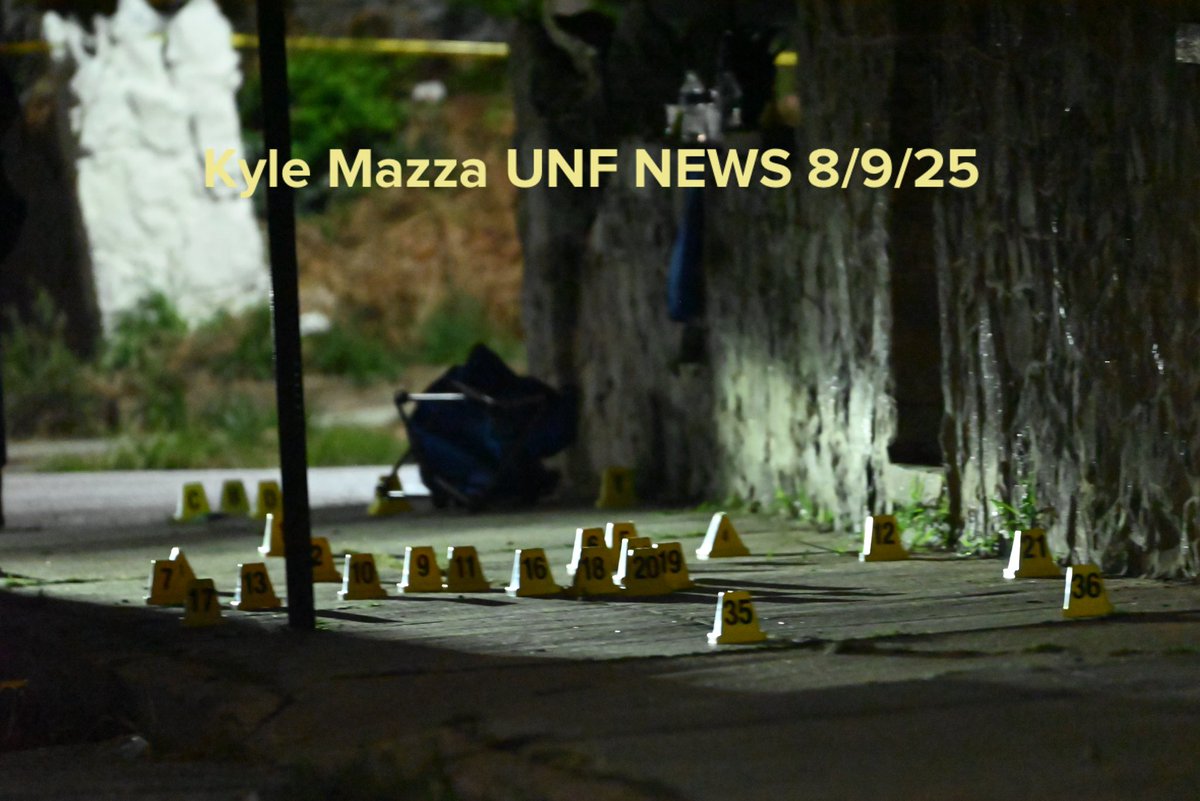 Baltimore police forensic investigators collected evidence and marked shell casings with evidence markers at the scene of a mass shooting that injured six people including a 5-year-old girl in Baltimore, Maryland on August 9, 2025. Saturday evening at approximately 8:46 p.m., Northern District Officers responded to the 5100 block of Queensbury Avenue and discovered, four males and two females with wounds. All of the victims were transported to area hospitals for treatment. A 38-year-old male, is originally listed in critical condition. The 5-year-old girl, a 23-year-old female, a 32-year-old male, a 33-year-old male and a 52-year-old male are believed to all be suffering from non-life-threatening injuries. There are no suspects in custody at this time and the investigation is ongoing.