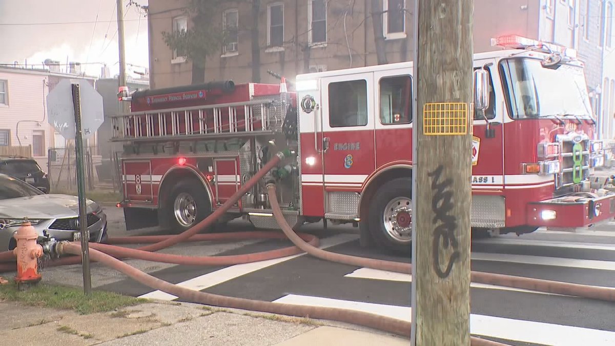 Baltimore Fire Department crews are on the scene of a fire with heavy smoke in the 400 block of W. 23rd Street