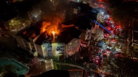Gaithersburg, MD - Aerial photos from the scene of a reported house fire, four story apartment building, fire through the roof, 2nd alarm in the 9800 Blk of Mahogany Dr., Sawyer flats