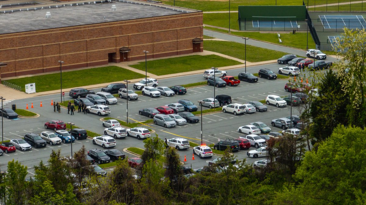 Colesville, MD - Aerial photos from the scene at James Hubert Blake High School where a person is being detained for firearm possession