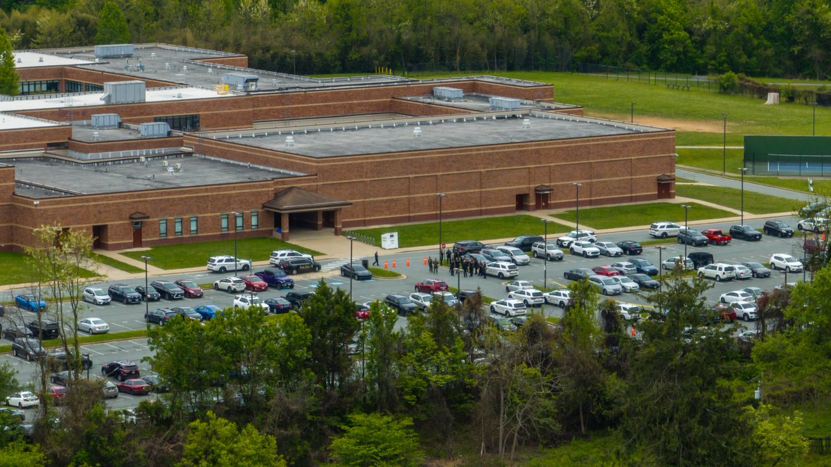 Colesville, MD - Aerial photos from the scene at James Hubert Blake High School where a person is being detained for firearm possession
