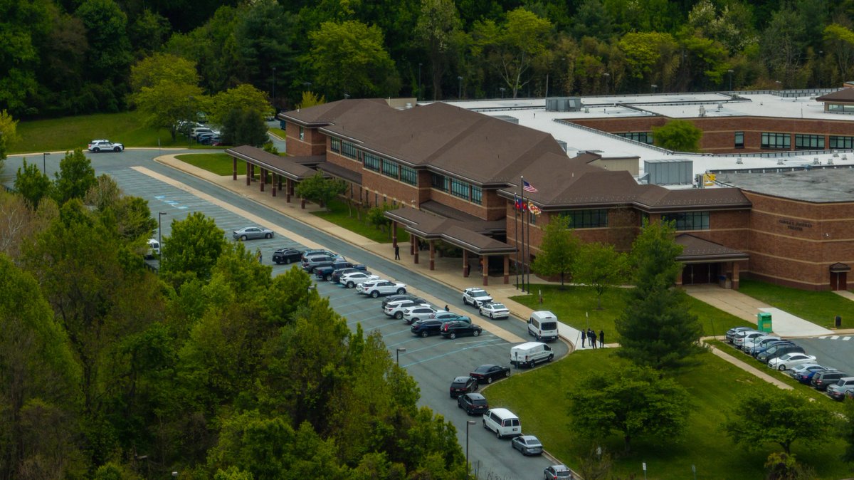 Colesville, MD - Aerial photos from the scene at James Hubert Blake High School where a person is being detained for firearm possession