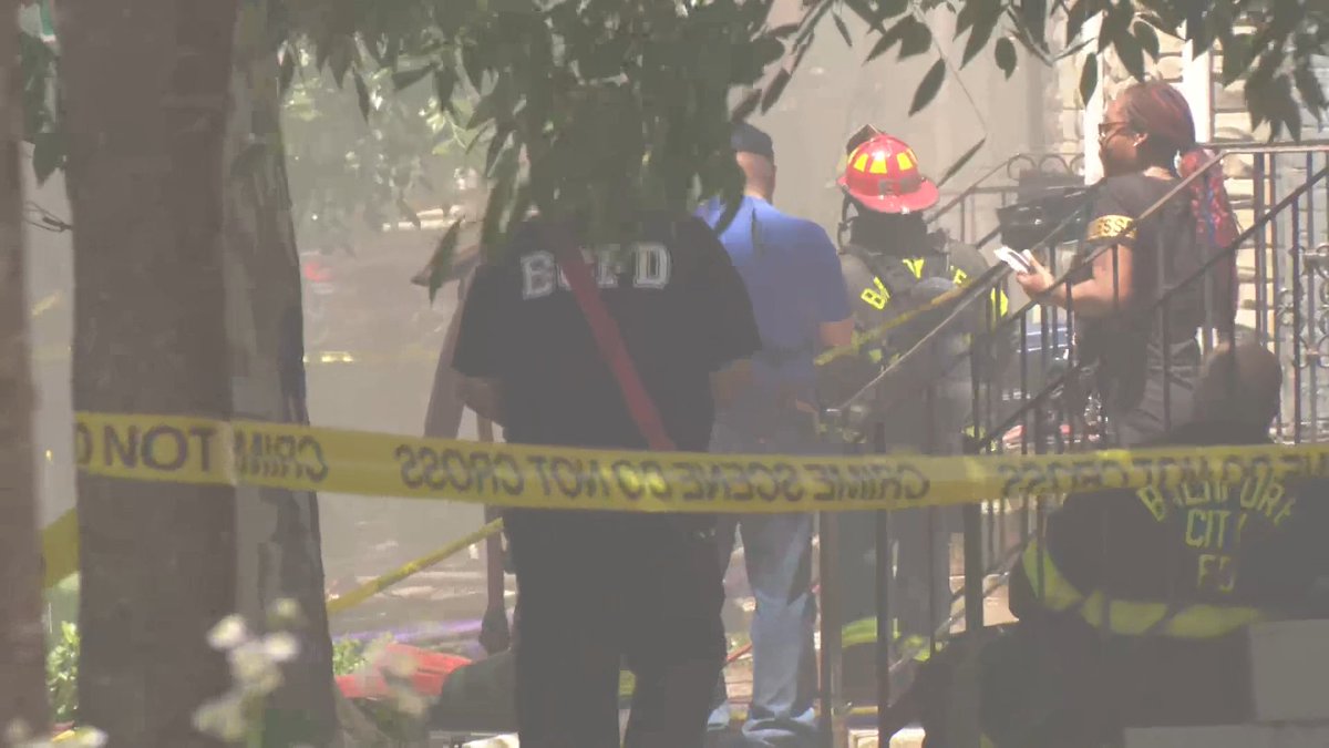 Crews battled a massive rowhome fire in Baltimore on Thursday