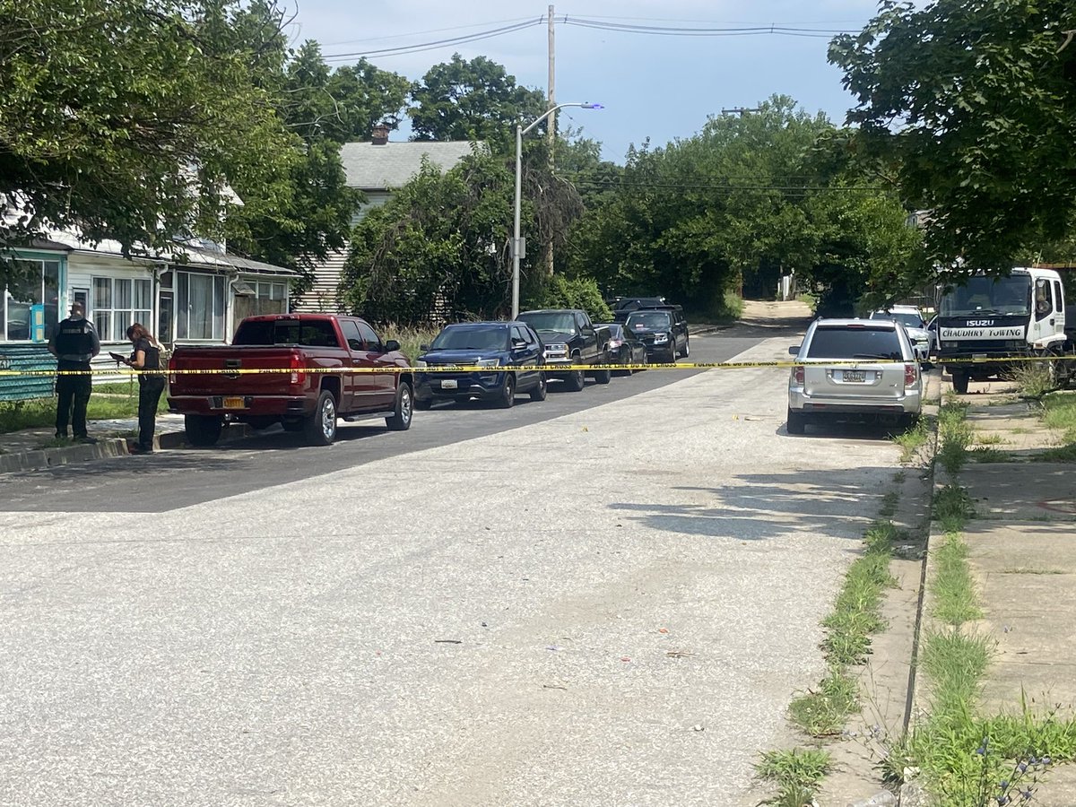 mass shooting in south Bmore. Six people including two juveniles were shot here off Hollins Ferry Rd.Police and crime lab techs back out at the scene.We saw bullet holes in one car. Another towed while here. Blood still on the sidewalk